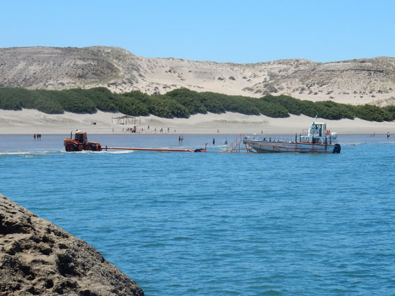 Pushing the boat from the beach out into the Golfo Nuevo